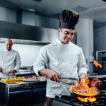 man cooks in a restaurant