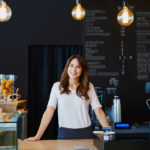 woman in restaurant with energy management system